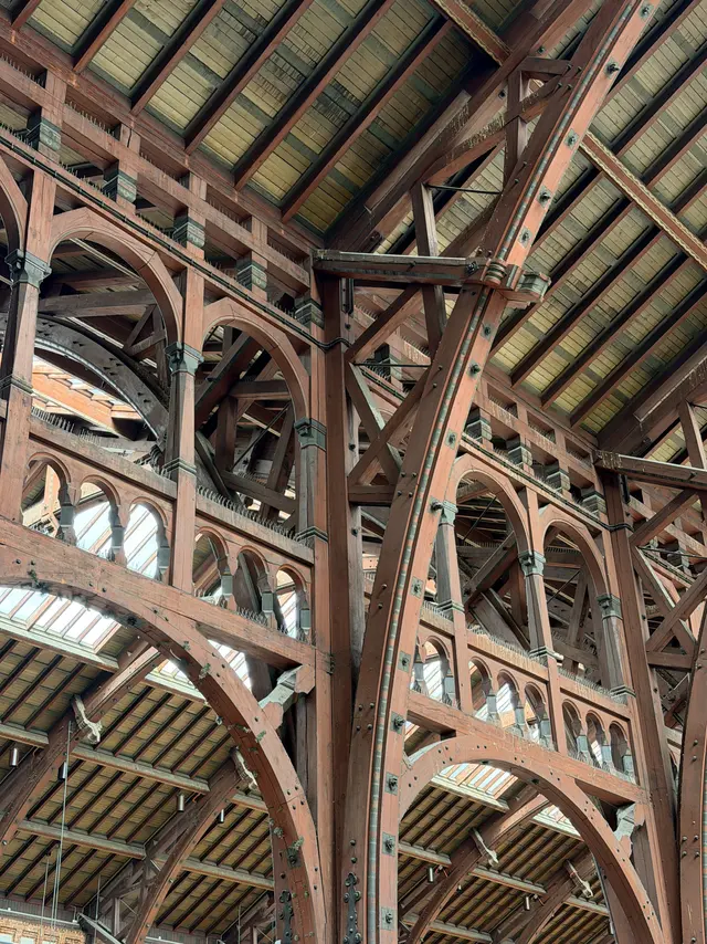 The main hall roof from below: arches built up out of boards, with diagonal braces between them.