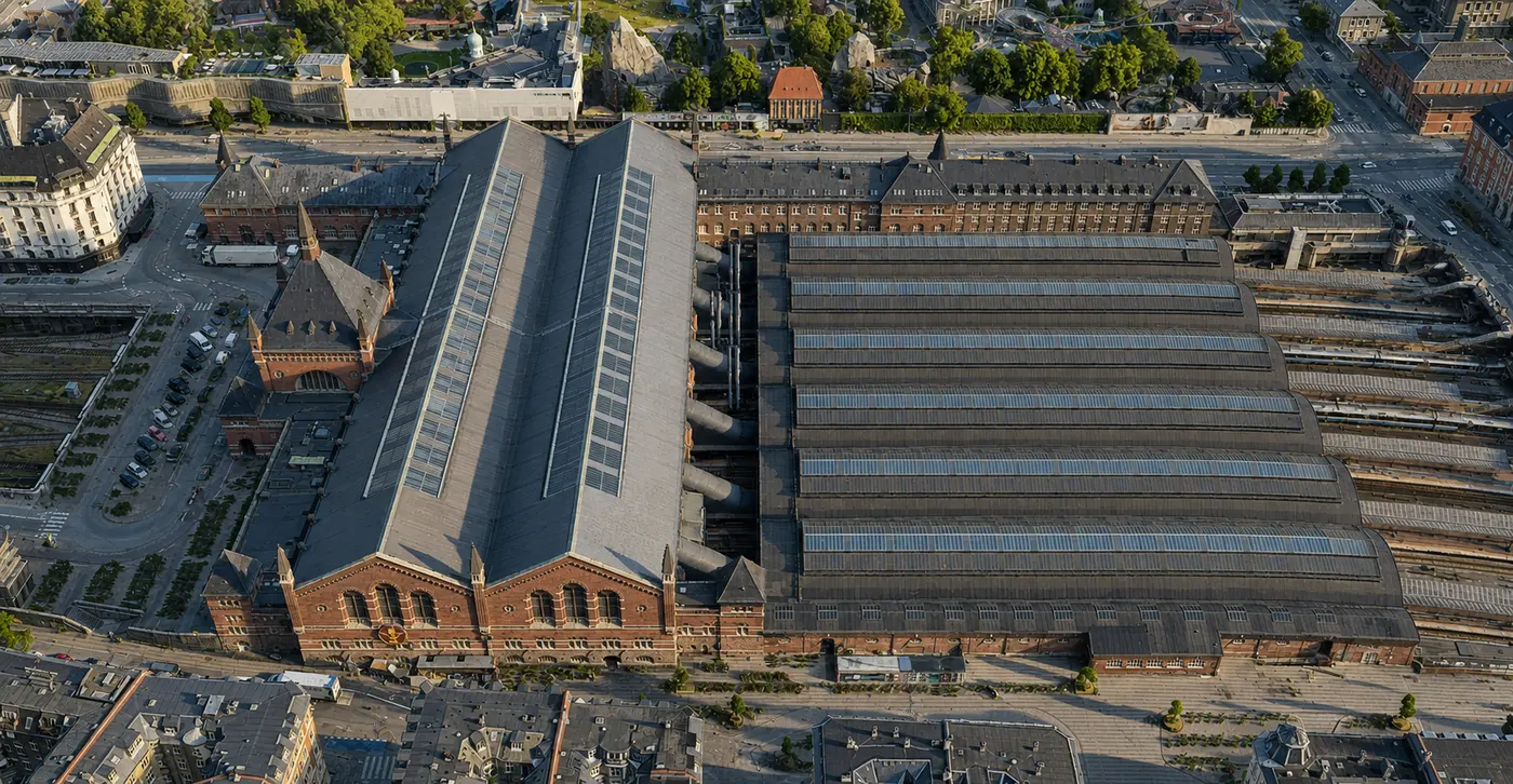 The station from the west, with the tracks running in beneath the hall.