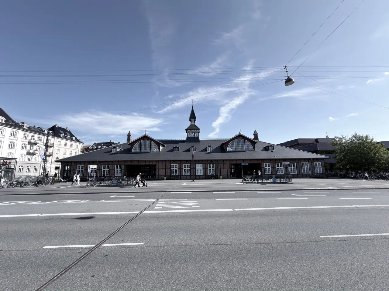The station across Oslo Plads in afternoon light.