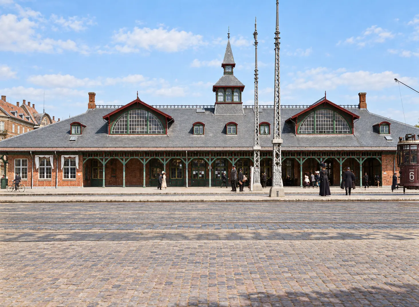 The street front in 1912 with the tower and spire between two arched windows.